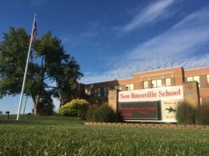 Entrance sign and school building at New Knoxville School in New Knoxville, Ohio.